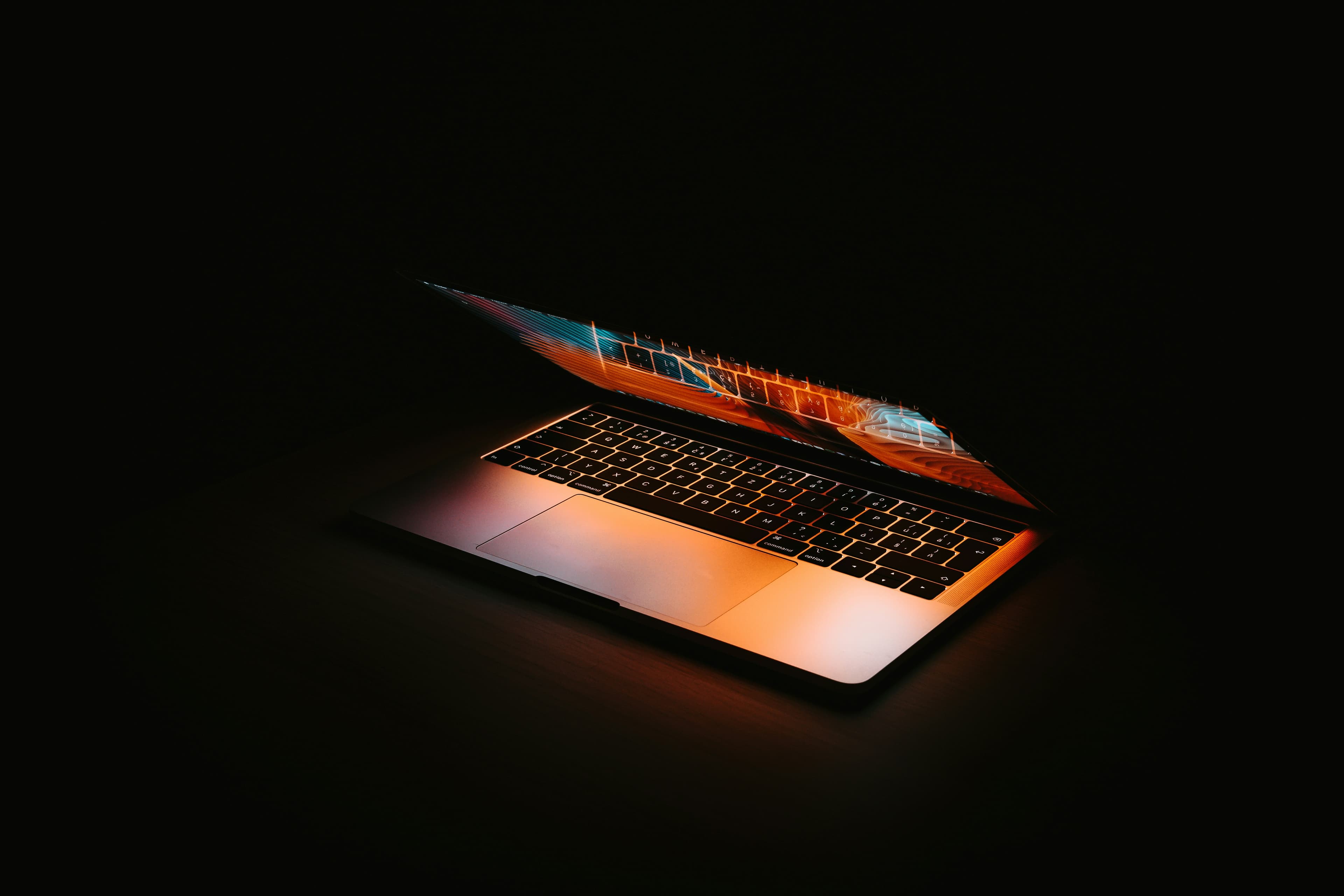 Modern laptop on dark background